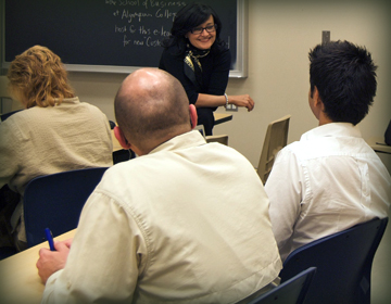 Faculty and students in class.