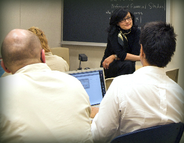 Faculty and students in class.