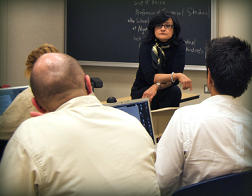 Faculty and students in class.