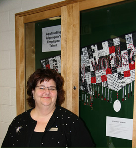 picture of beth cameron by display case