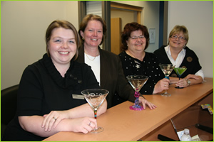 picture of ladies drinking water out of martini glasses